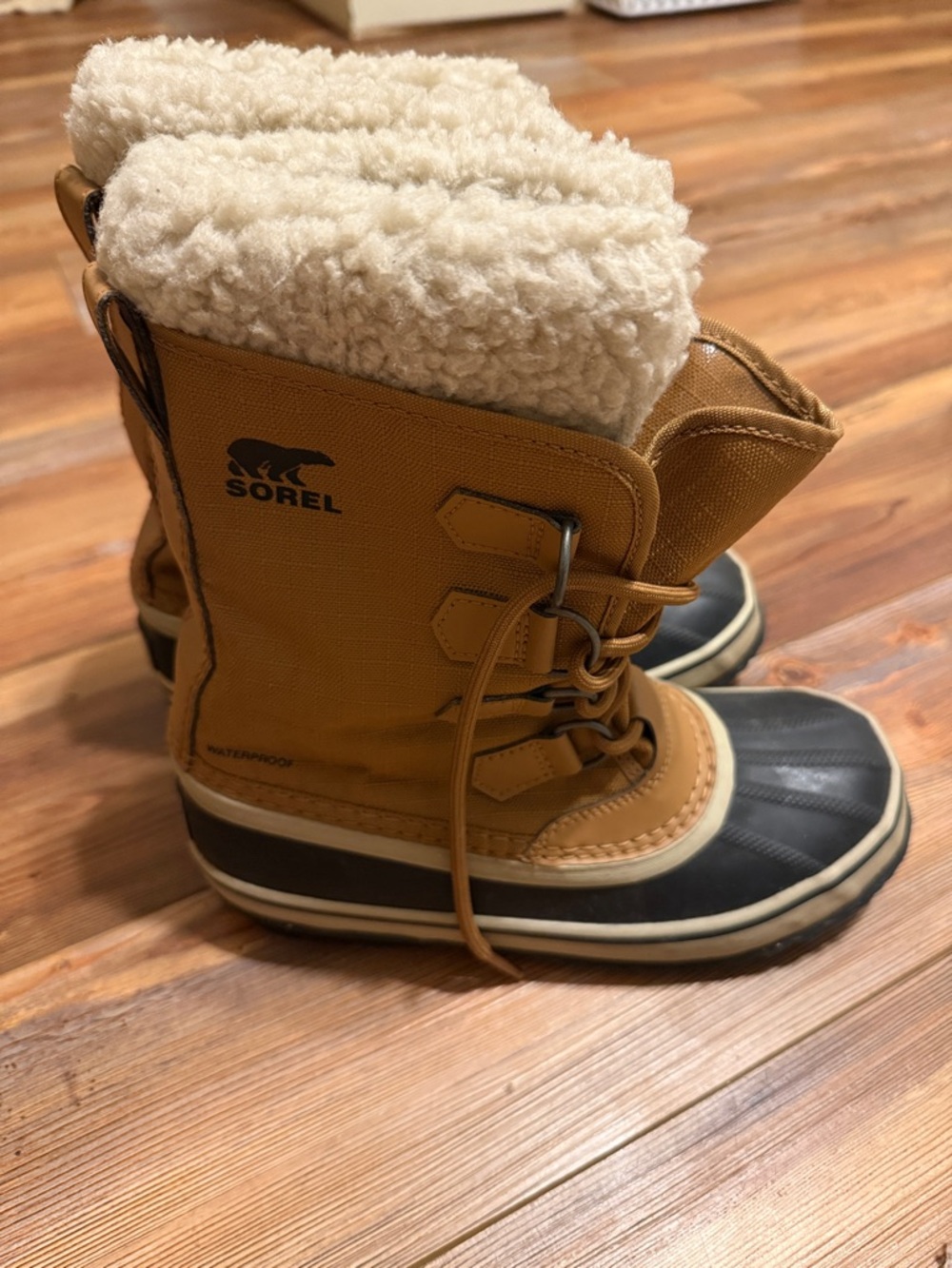 Sorel Tan and Black Insulated Lace-Up Winter Boots